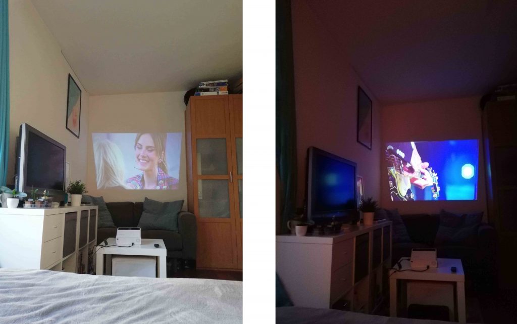 Het beeld van de beamer van LifeGoods in gebruik in een lichte kamer en in het donker